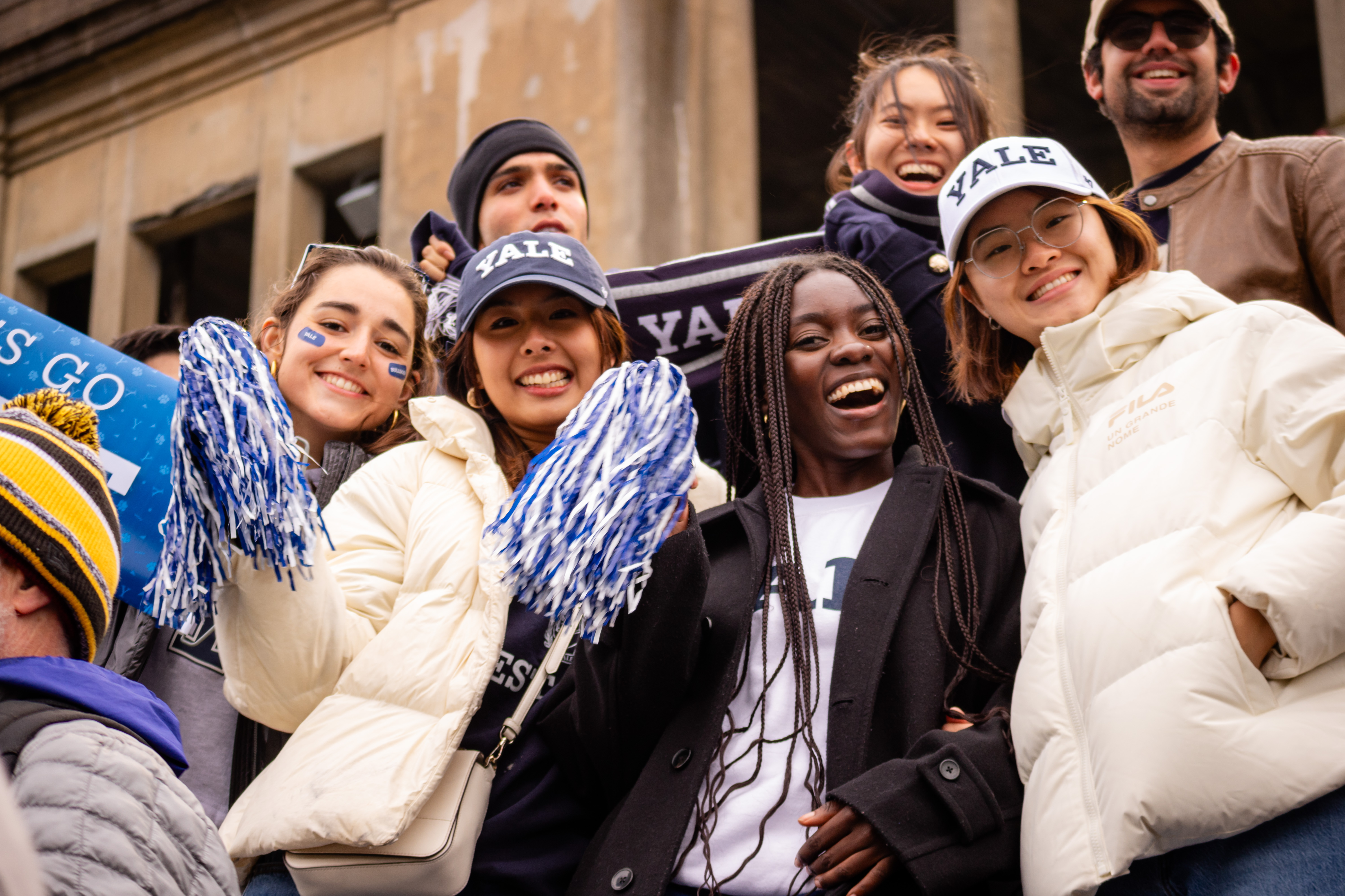 Group of students wearing yale colors during homecoming